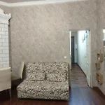 с балконом в центре города *